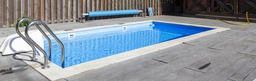 bigstock-Swimming-Pool-Patio-Area-And--359270926.jpg